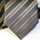 Набор Aristokrat галстук с платком черного цвета с косыми золосто-кофейными линиями